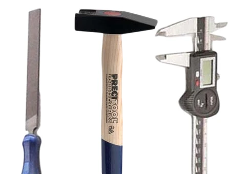 Abbildung Feile, Hammer und Messschieber