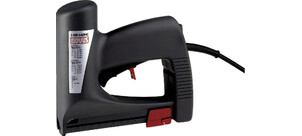 Ein seitlicher Blick auf einen schwarzen Elektro-Tacker mit Netzkabel und rotem Abzug.